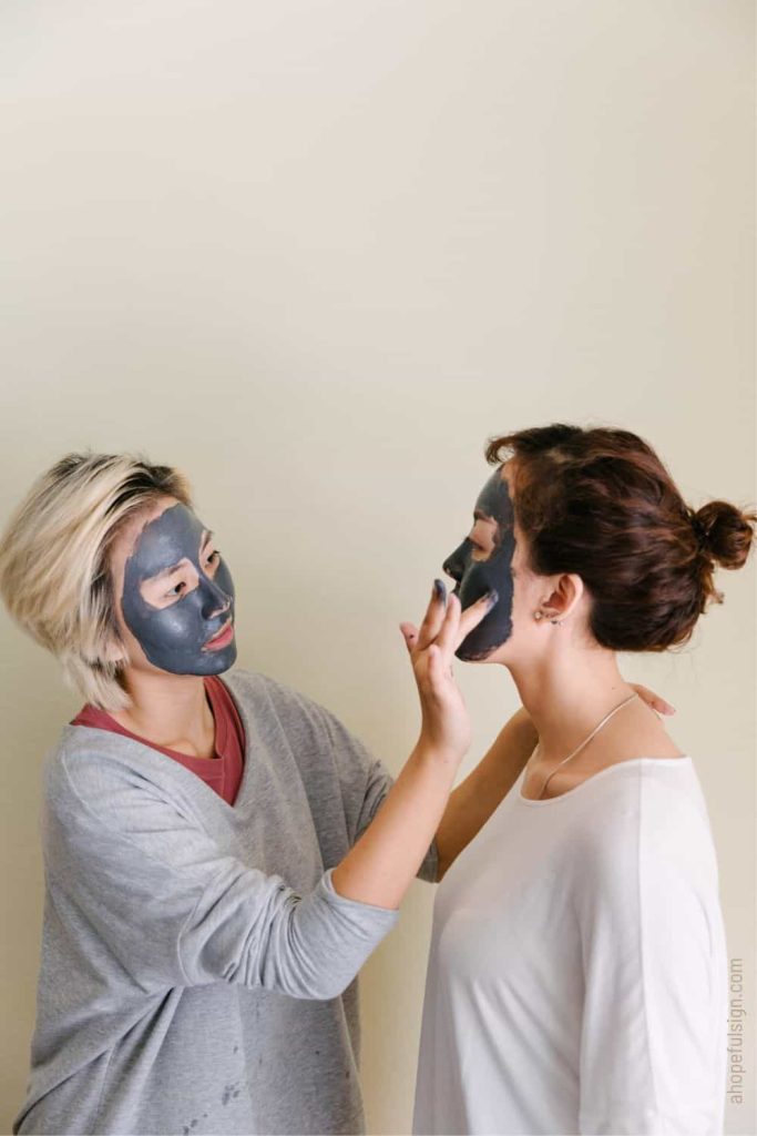 Twin flame women putting beauty masks