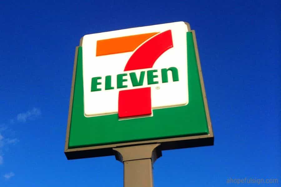 Angel number 711 meaning: 7-eleven road sign