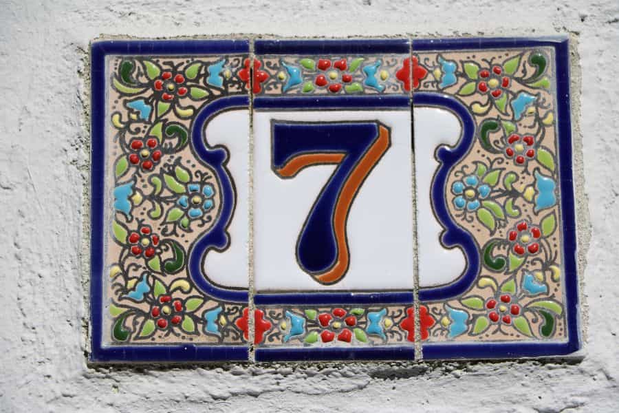 Angel number 7 meaning: Number 7 on house wall