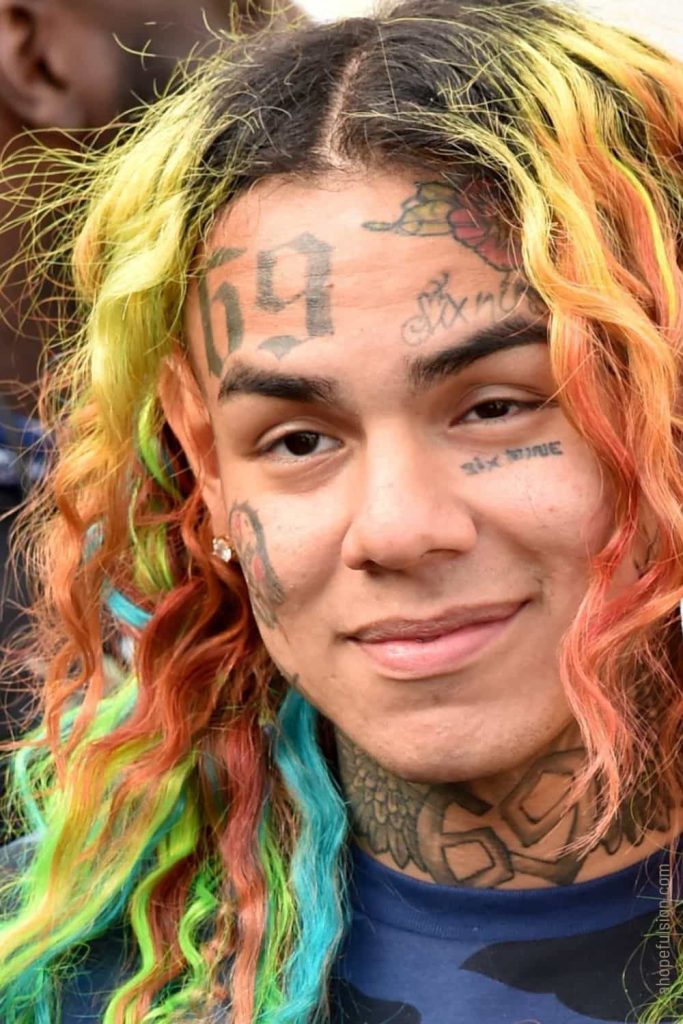 Rapper 6ix9ine face close up