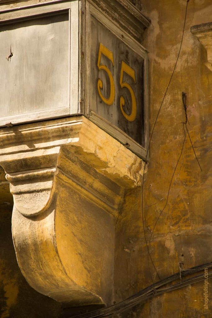 Window with beautiful color and number 55 Malta