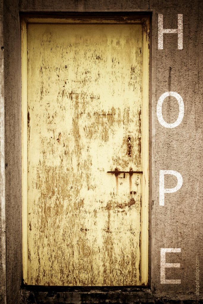 Wooden door hope concept