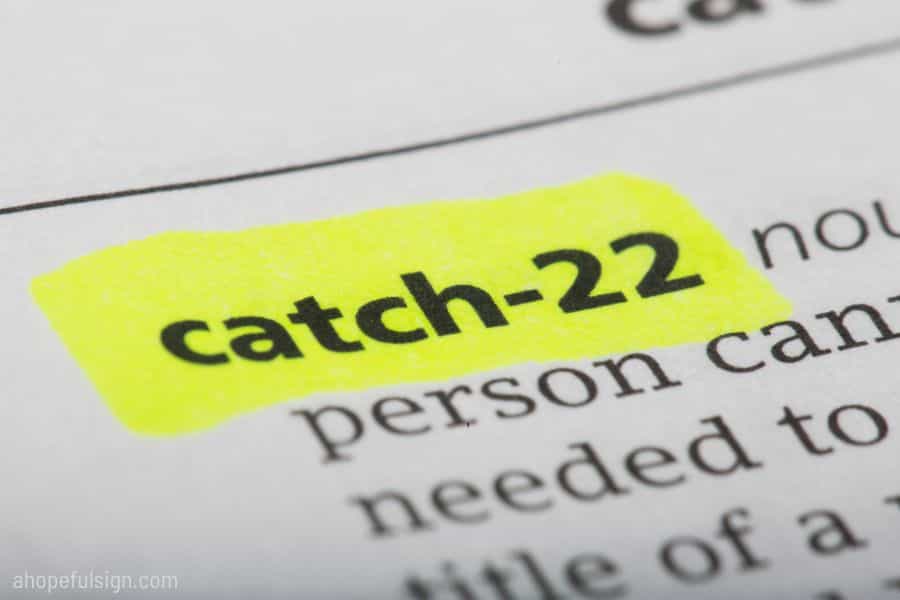 Word catch 22 printed and defined in the English dictionary