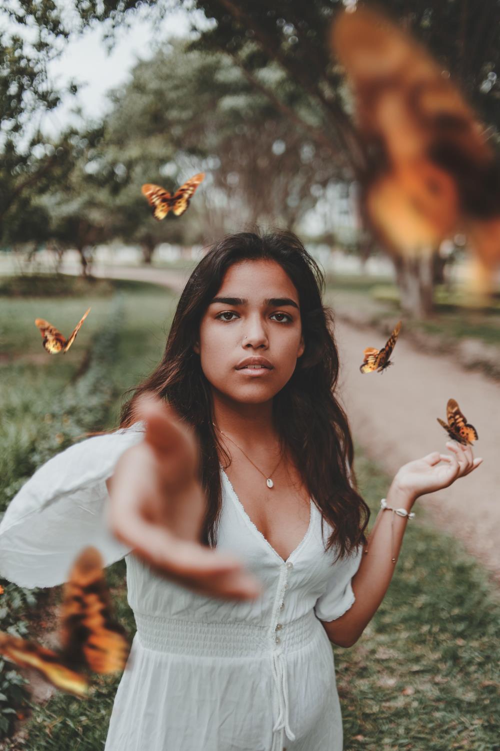 Girl with orange butterflies