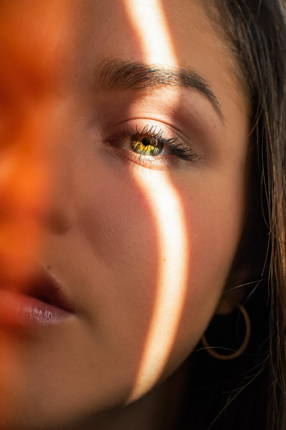 Woman face left eye close-up