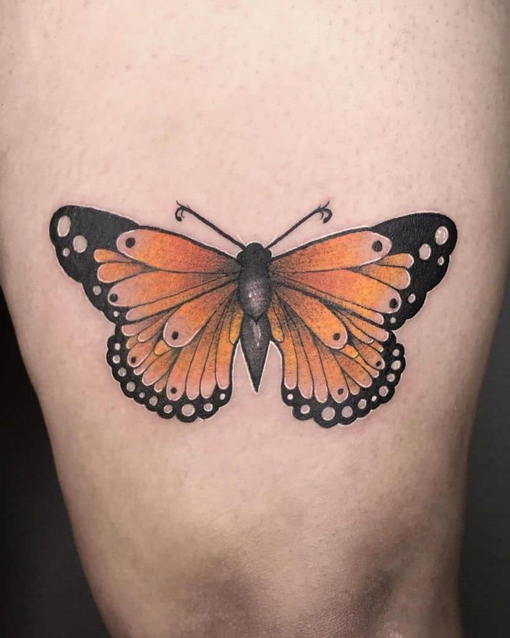 Orange butterfly's meaning: Orange butterfly tattoo